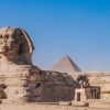 The Great Sphinx with the Pyramids of Giza behind it