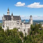 Neuschwanstein Castle above the Bavarian forest in autumn