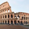 The Roman Colosseum lit by warm evening light