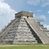 El Castillo pyramid at Chichen Itza under a clear blue sky