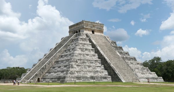 El Castillo pyramid at Chichen Itza under a clear blue sky