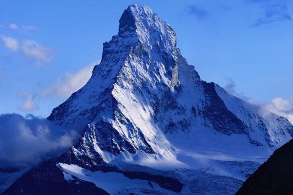 The Matterhorn peak reflected in an alpine lake near Zermatt